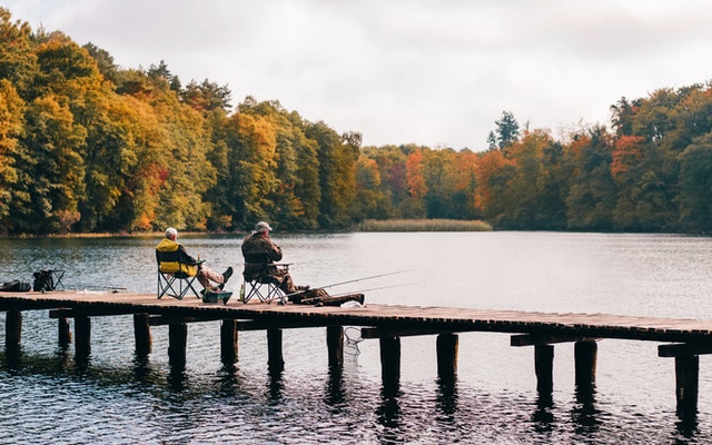 fishing in the fall near a mountain