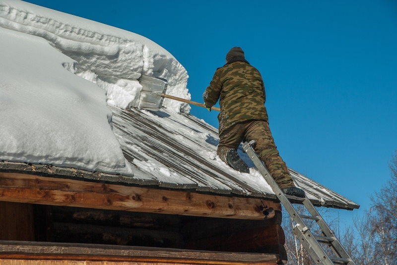 removing snow from roof